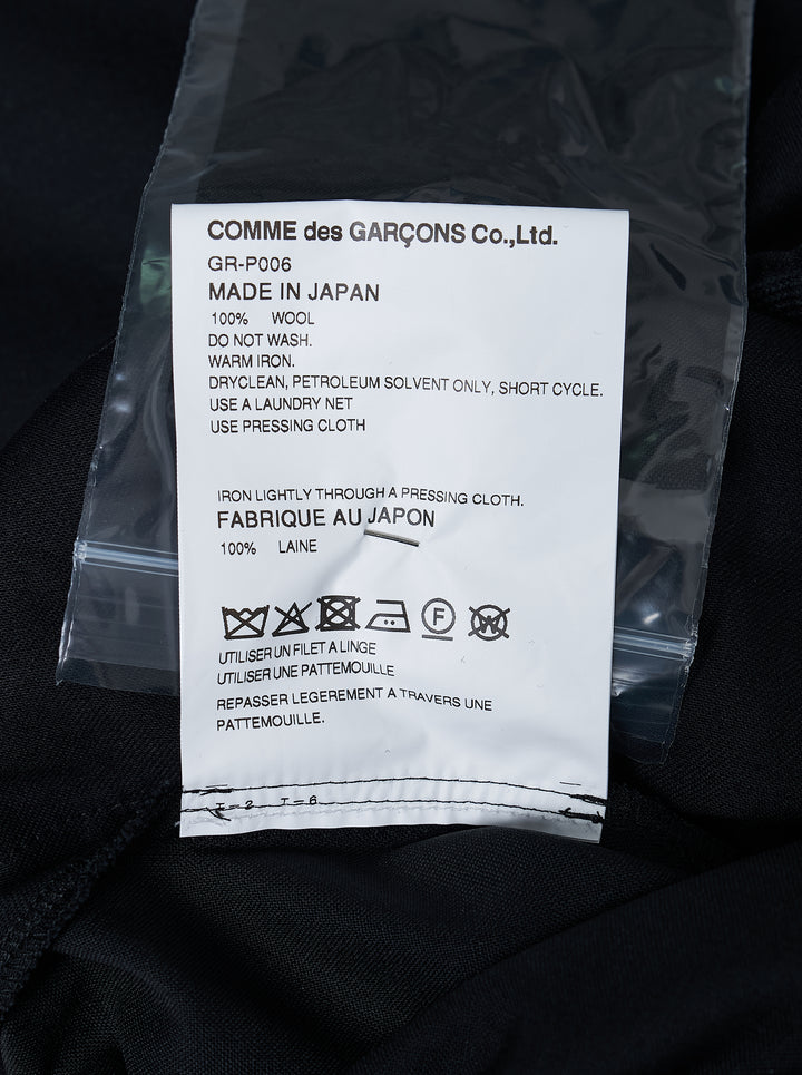 Black balloon pants with an elasticated waist and gathered hems by Comme des Garçons - view 3
