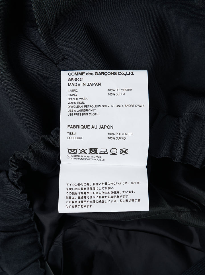 Comme des Garçons black voluminous balloon midi skirt with asymmetric sculptural ruffle clusters and elasticated waistband, product flat lay on white background - view 3