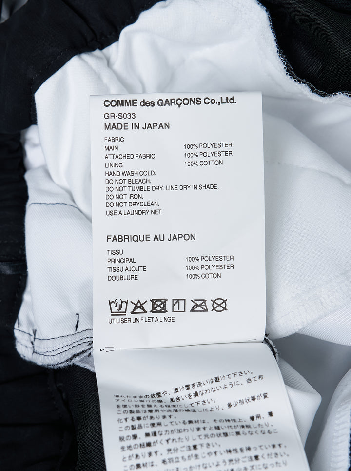 Comme des Garçons layered asymmetrical skirt in sheer black with ruched white lining and contrast white hem - view 3