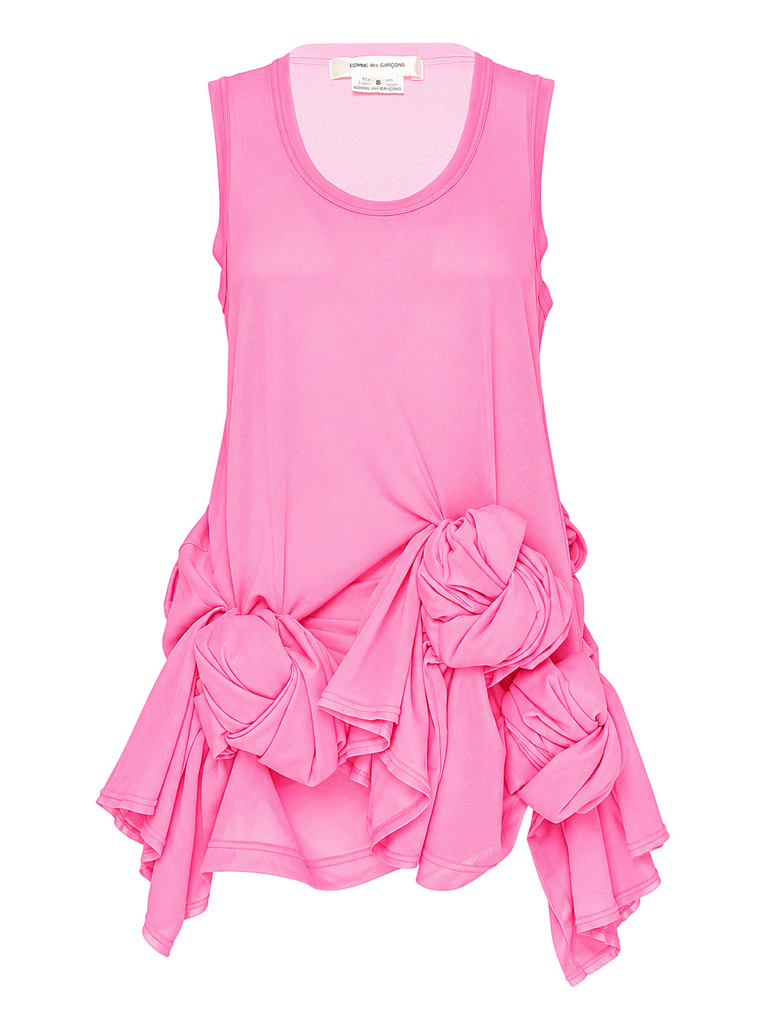 Comme des Garçons bright pink sleeveless tank top with dramatic knotted and gathered ruffle detailing across the lower hem, shown flat on a white background