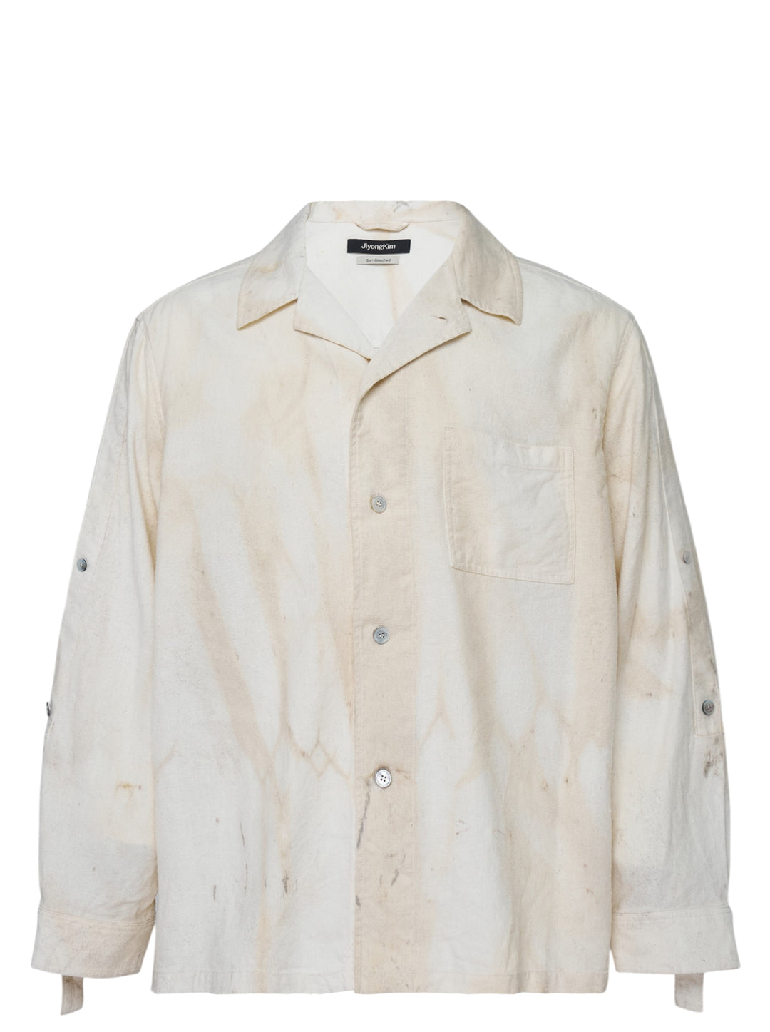 JiyongKim Sun-Bleached Strap Shirt in a faded cream finish with camp collar, button front, chest pocket and sleeve straps