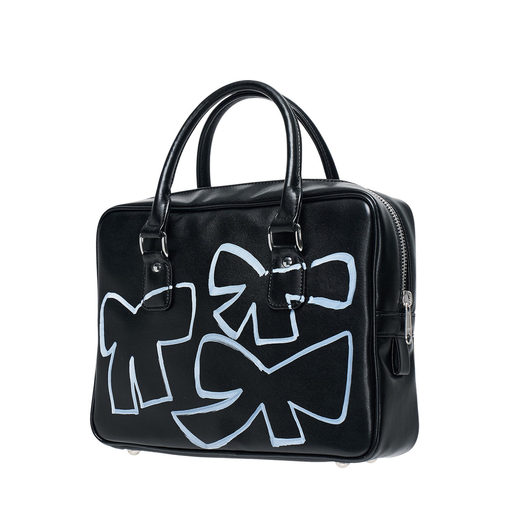 Comme des Garçons Girl black structured handbag with hand-painted pale blue bow graphic and 'Girl' lettering on the front, dual rolled handles and silver-tone hardware
