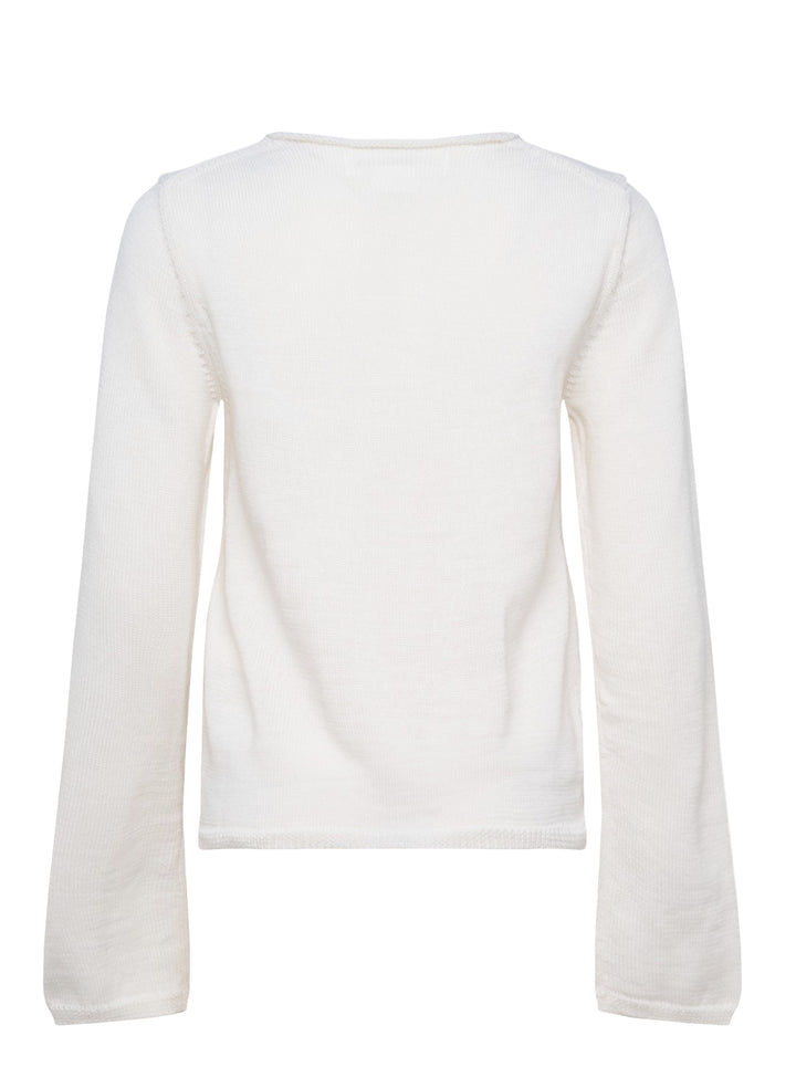 Comme des Garçons Girl ivory long sleeve fine knit top with 3D crochet unicorn appliqué in white and pink on the chest, crew neckline, flat lay on white background - view 2