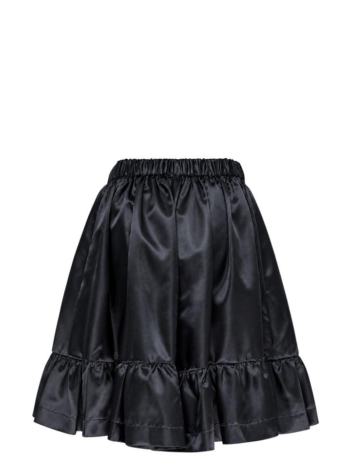 Comme des Garçons Girl black satin shorts with elasticated ruched waistband, gathered silhouette, and tiered ruffle hem, shot flat on a white background - view 2