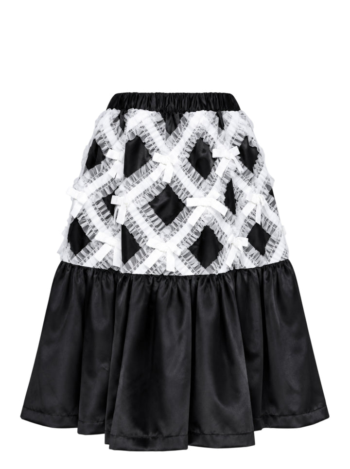 Comme des Garçons Girl black satin A-line skirt with white criss-cross tulle lattice overlay and satin ribbon bows, gathered flared hem, white background - view 2
