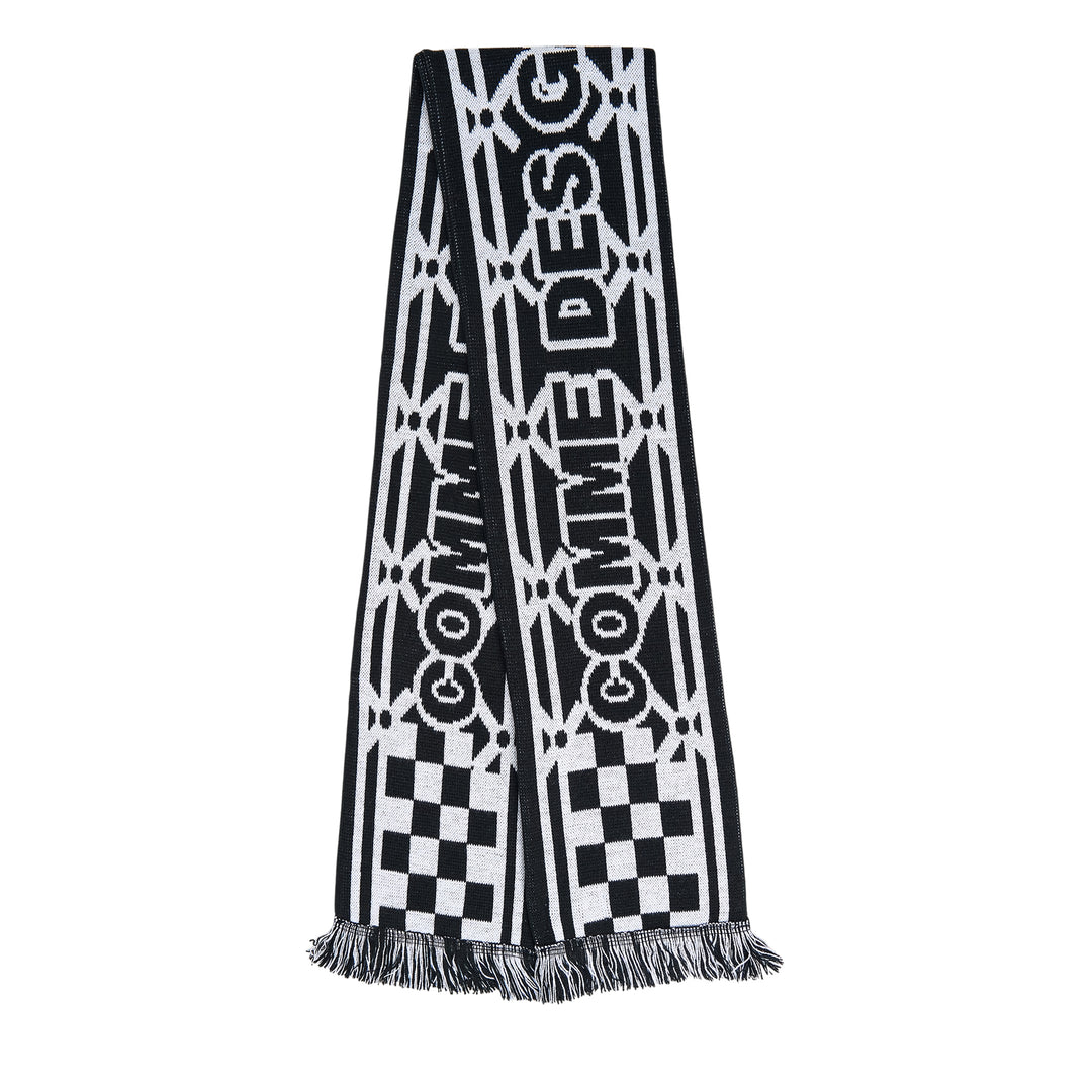 Comme des Garçons Girl holiday knitted acrylic stole with all-over reindeer and tree jacquard motifs in red, pink, and white, with fringe trim at both ends