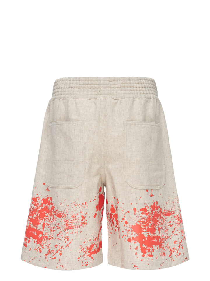Comme des Garçons Shirt oatmeal wool shorts with red paint splash print along the hem and a ribbed elasticated waistband - view 2