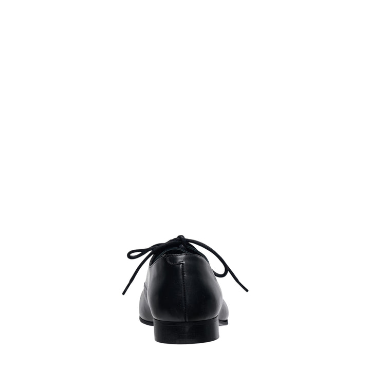 Comme des Garçons Comme des Garçons black leather lace-up Oxford shoe with sculptural round toe and low block heel, side profile view - view 3