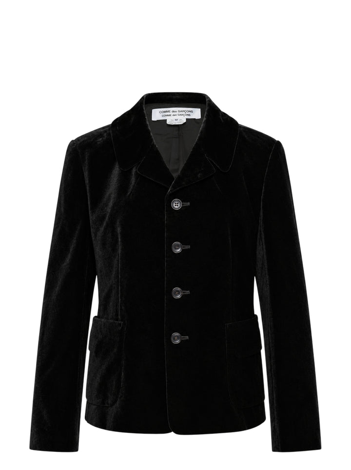 Black velvet tailored jacket with rounded collar, four-button front and two patch pockets by Comme des Garçons Comme des Garçons