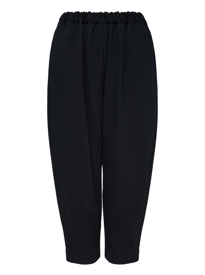 Comme des Garçons Comme des Garçons black tapered cocoon pants with elasticated ruched waistband and cropped narrow hem, front view