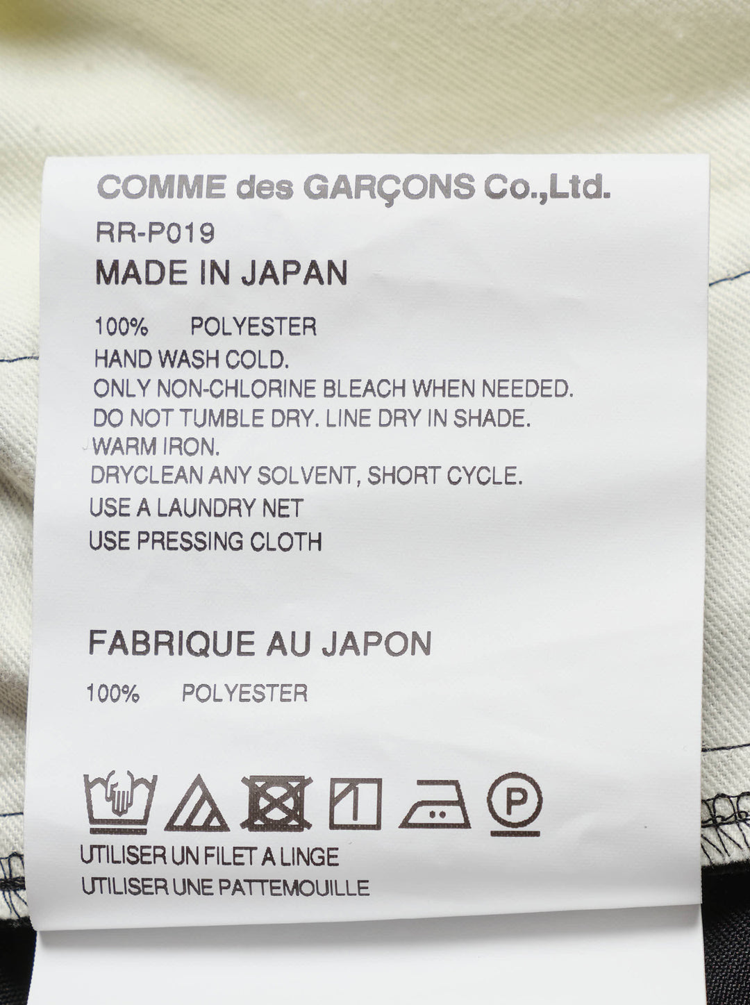 Black wide-leg Comme des Garçons Comme des Garçons pants with an elasticated gathered waist and oversized draped cargo pockets, shown from the front - view 3