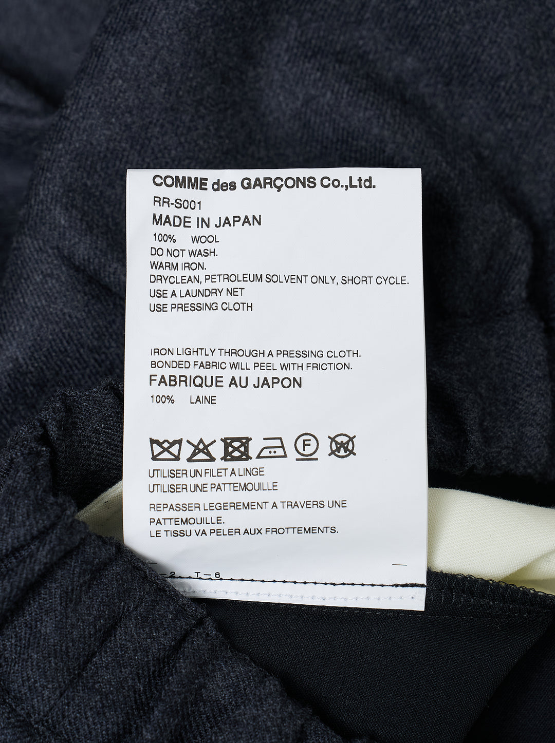 Comme des Garçons Comme des Garçons voluminous cocoon midi skirt in charcoal grey with elasticated drawstring waist and gathered sculptural silhouette, displayed flat on white background - view 3