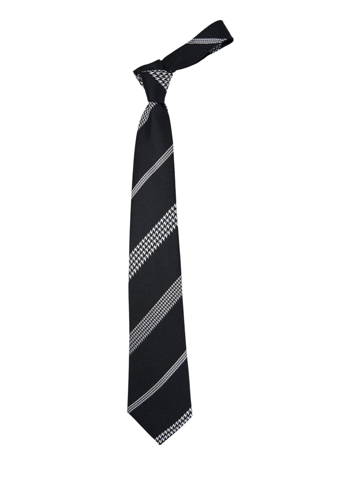 Comme des Garçons Homme Deux black silk necktie with diagonal houndstooth-weave stripe pattern on a white background