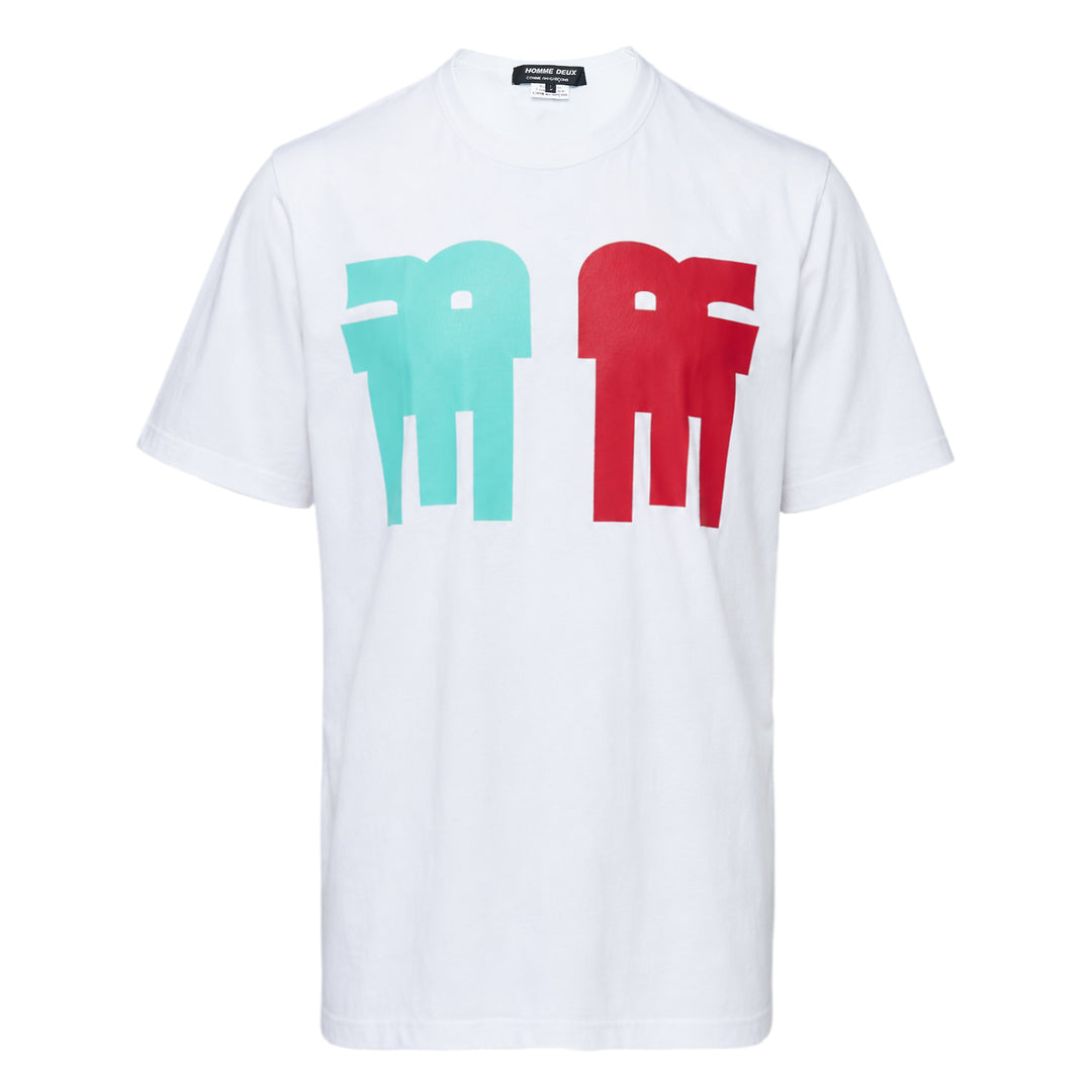 Comme des Garçons Homme Deux white cotton jersey tee with large abstract graphic print featuring two humanoid figures in teal and red on the chest