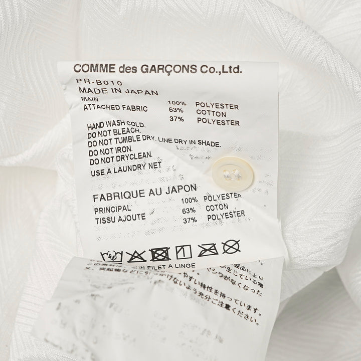 Comme des Garçons Homme Plus white long sleeve shirt with tonal lace floral yoke panel, pearlescent button fastening, and an elongated relaxed silhouette - view 3