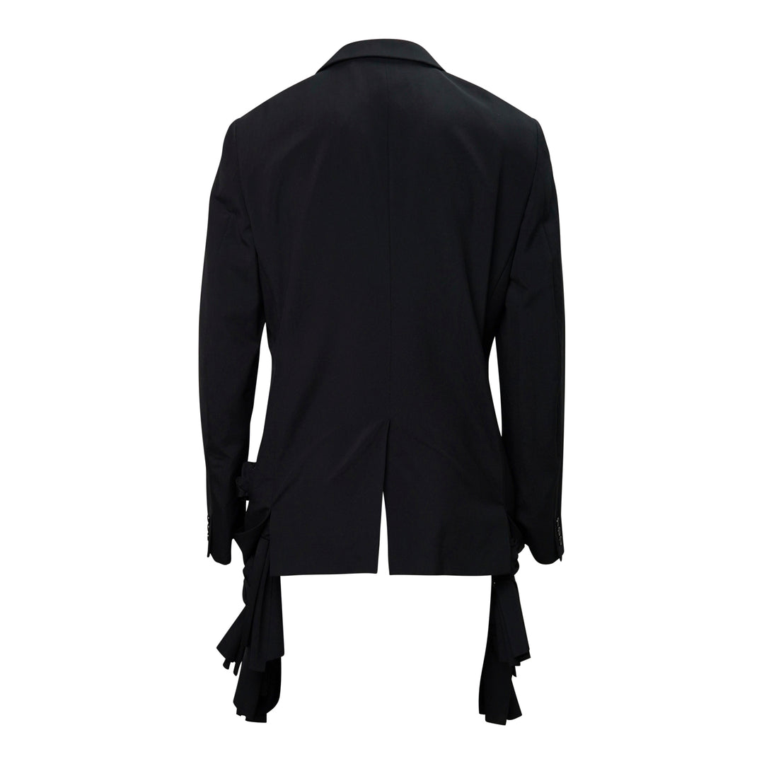Comme des Garçons Homme Plus black tropical wool single-breasted jacket with gathered fabric loop appliqués across the body and cascading deconstructed strip detailing at the hem, front view on white background - view 2