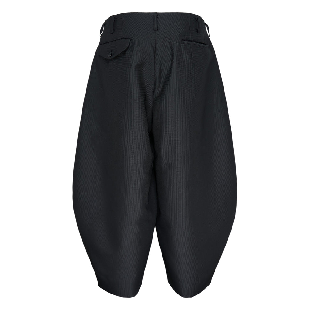 Comme des Garçons Homme Plus black polyester dobby stripe A-type pants with a voluminous sculptural silhouette and high-rise waistband, viewed from the front - view 2