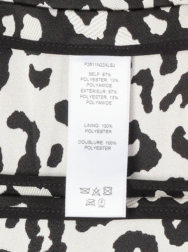 Carolina Herrera sleeveless boatneck top in black-and-ivory leopard jacquard, featuring a centre-front covered button placket, fitted waist, and flared peplum hem with box pleats - view 3
