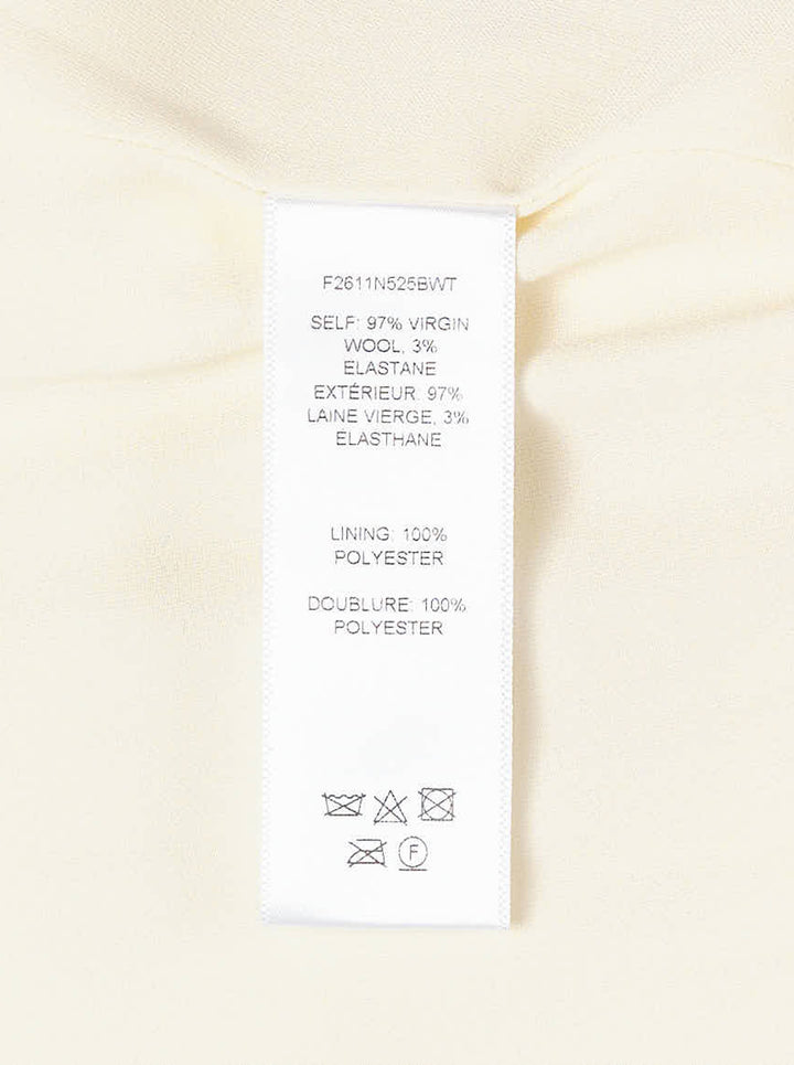 Carolina Herrera ivory sleeveless boatneck midi dress with ruched asymmetrical hem and self-tie bow detail, displayed flat on white background - view 3