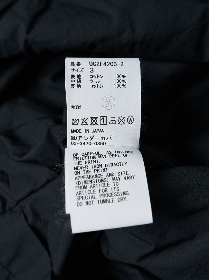 Undercover Cindy Sherman black padded zip-up hooded blouson with diagonal zip pockets, front view - view 3