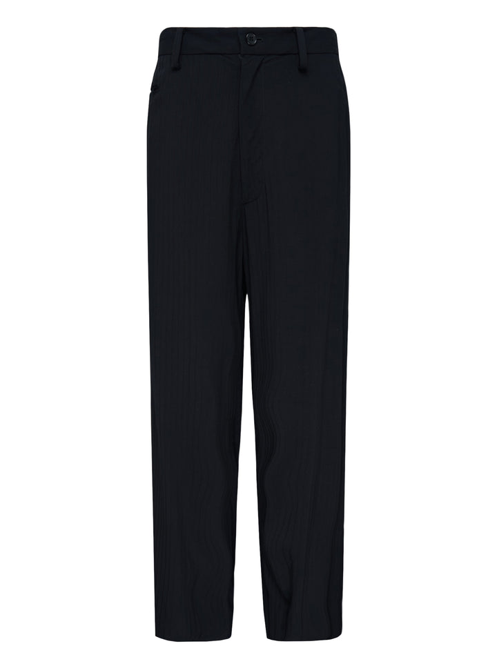 Undercover black stripe wool pants with tonal pinstripe texture, button waistband and straight leg, shown front view