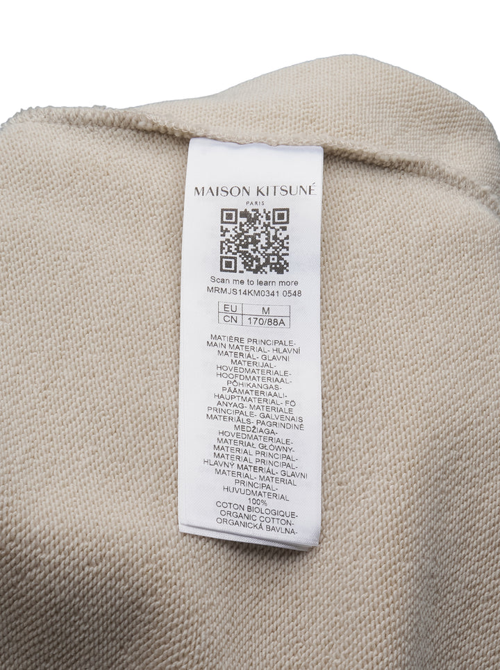 Maison Kitsuné Chillax Fox Comfort Sweatshirt in ivory with embroidered Chillax Fox motif on the chest, ribbed crew neck and cuffs, relaxed fit — front view - view 3