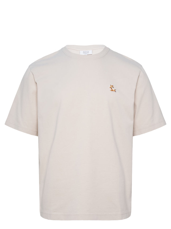 Maison Kitsuné Chillax Fox Comfort Tee in off-white with a small embroidered lounging fox patch on the chest, crew neck, and short sleeves
