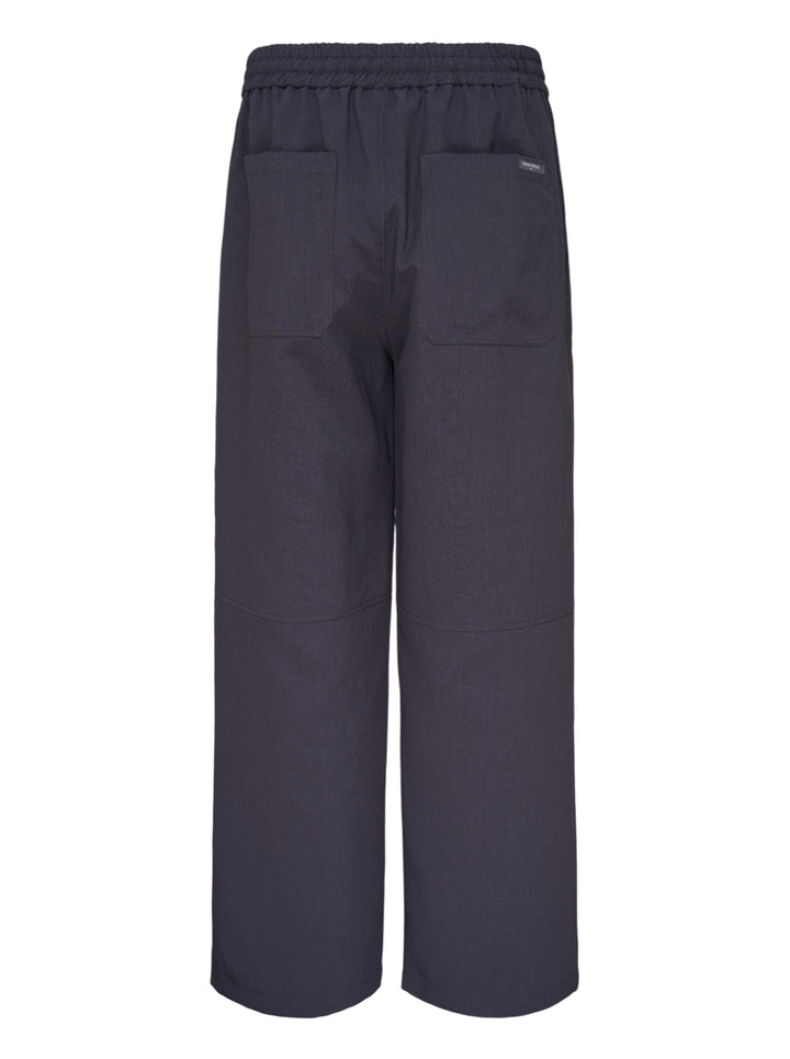 Maison Kitsuné Elasticated Cargo Pants in dark charcoal navy, featuring a wide-leg silhouette, elasticated waistband, articulated knee panelling, and a flap cargo pocket on the leg - view 2