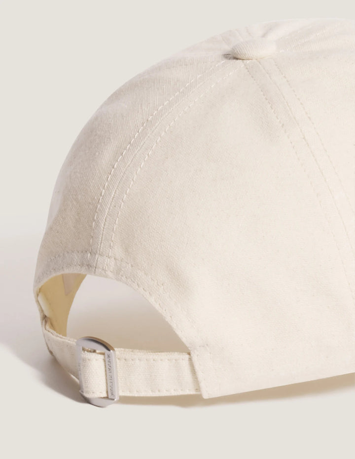 Maison Kitsuné Fortune Fox Cap in cream with an embroidered black fox head patch on the front and a curved brim - view 6