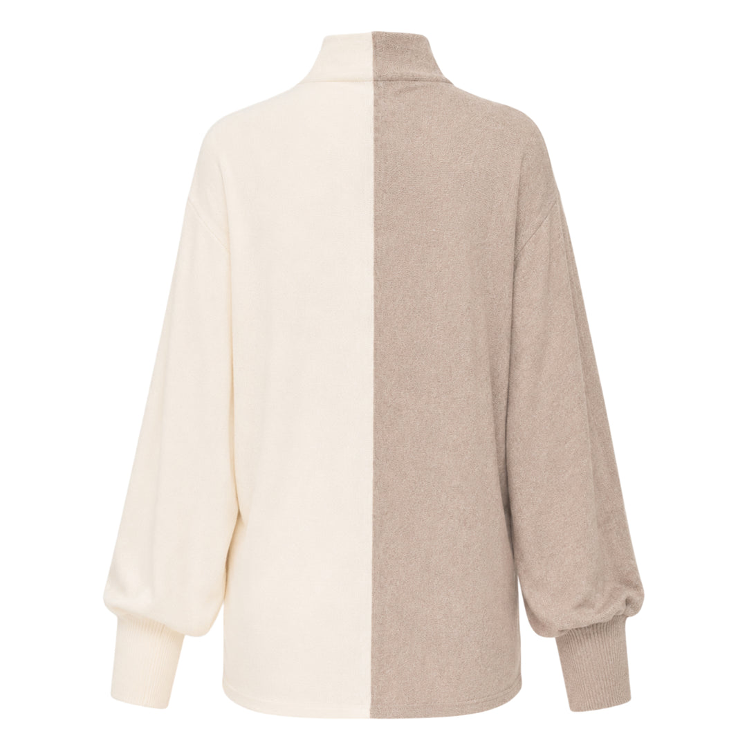 Jacquemus Losange two-tone knit top with vertical colourblock split in oat and cream, featuring a mock turtleneck collar, snap-button placket, and blouson long sleeves with ribbed cuffs - view 2