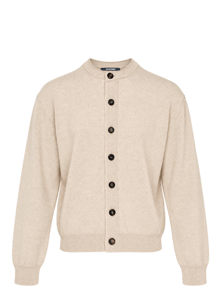 Jacquemus Le Cardigan Moulin in beige knit with a collarless neckline and dark tortoiseshell-effect front buttons