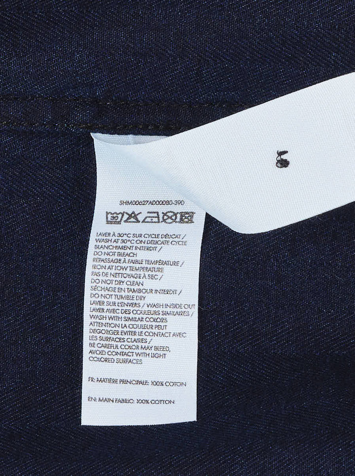 Jacquemus Denim Pyjama Shirt in dark indigo with camp collar, short sleeves, button front and embroidered chest pocket - view 3