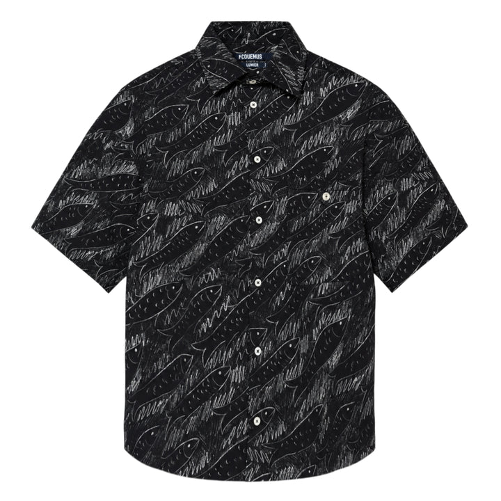 Jacquemus La Chemise Rio short sleeve shirt in black with an all-over white hand-drawn fish print and mother-of-pearl button fastening