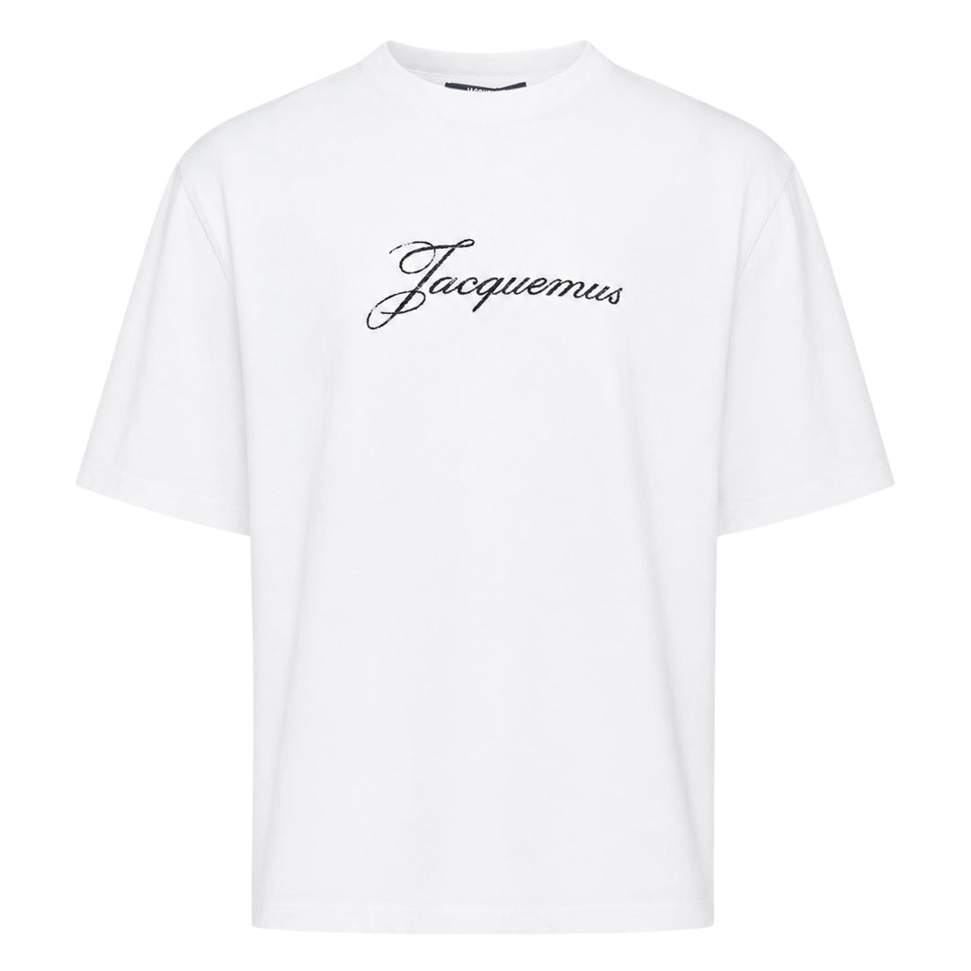 Jacquemus white oversized crew neck tee with distressed cursive Jacquemus script logo print across the chest