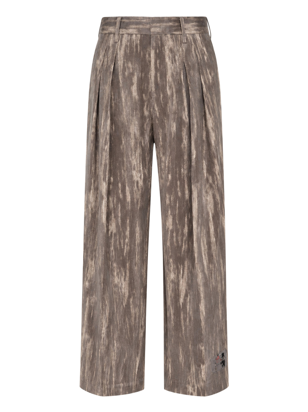 doublet Dust Flocky Trousers in a mottled earthy brown abstract print, featuring wide-leg cut with front pleats and embroidered graphic at the hem, displayed flat on white background