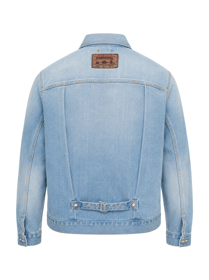 doublet Air Yarn Faded Denim Jacket in light-wash blue with archival printed patch labels on the chest pocket and cuff, featuring amber topstitching and gunmetal button fastening - view 2