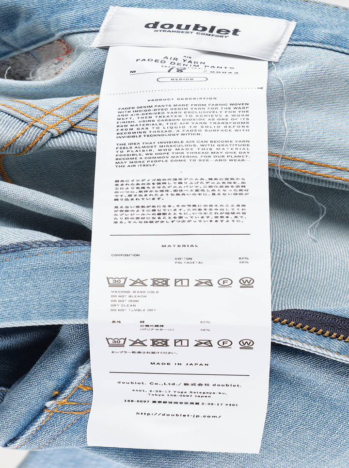 doublet Air Yarn Faded Wide-Leg Jeans in light wash blue, front view showing high-rise waist, five-pocket detail, and exaggerated wide leg silhouette with contrast orange topstitching - view 4