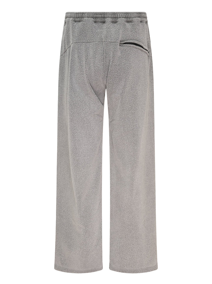 doublet Air Yarn Fleece Pants in heathered grey, featuring a wide-leg silhouette, elasticated drawstring waistband, zip side pockets, and a triangle logo patch at the hip - view 2