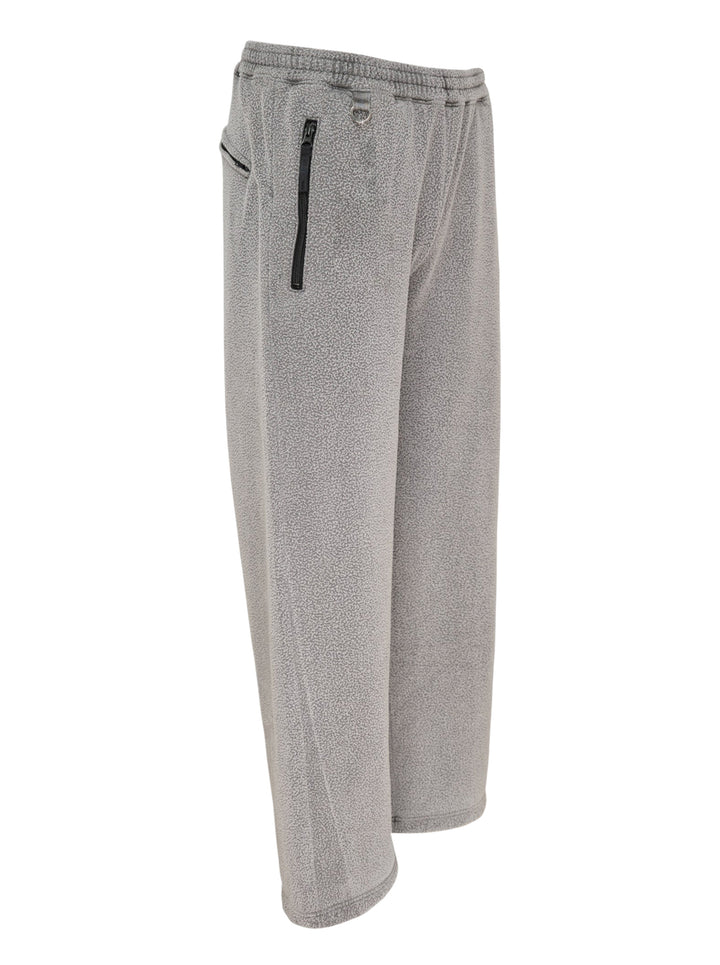 doublet Air Yarn Fleece Pants in heathered grey, featuring a wide-leg silhouette, elasticated drawstring waistband, zip side pockets, and a triangle logo patch at the hip - view 4