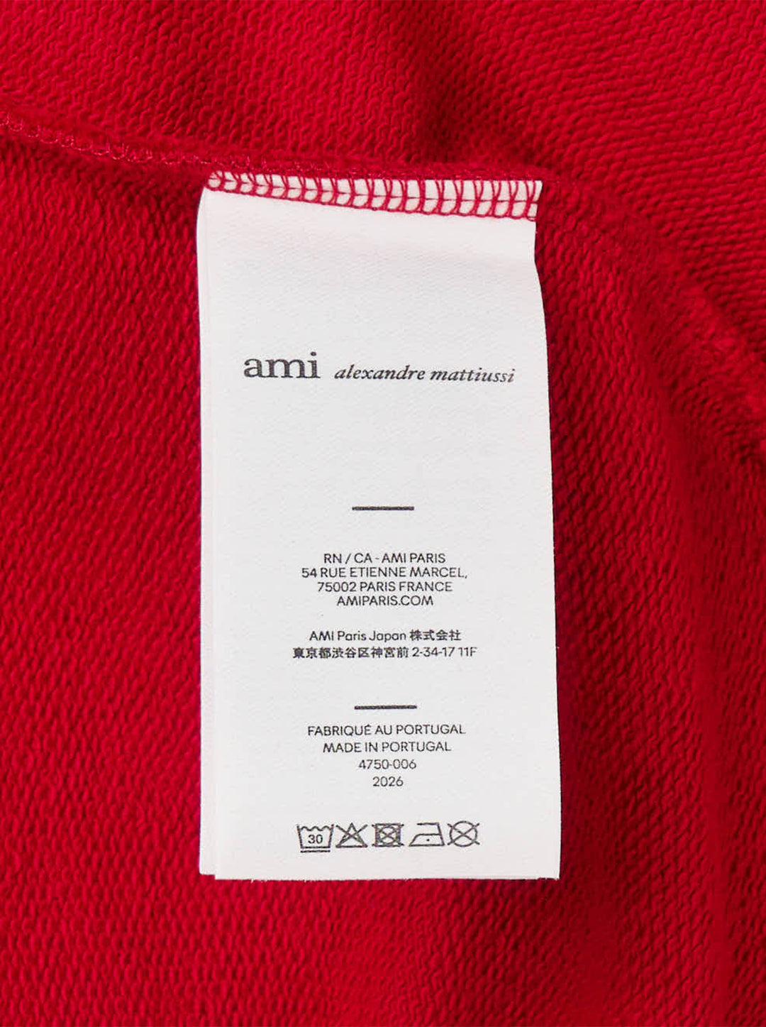 AMI Paris Bicolor Crewneck Sweatshirt in red with cream contrast ribbed collar and cuffs, featuring an embroidered Ami de Cœur logo on the chest - view 4