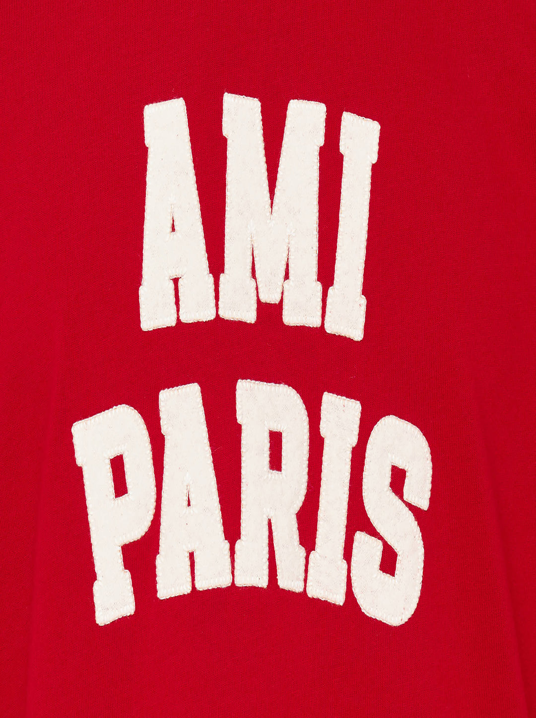 AMI Paris two-tone T-shirt with red body, ivory short sleeves and collar, and oversized white felt 'AMI Paris' collegiate lettering on the chest - view 3