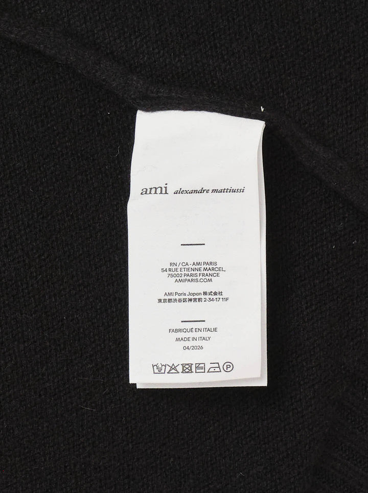 AMI black crewneck sweater in chunky knit with ribbed collar, cuffs and hem, shown flat from the front - view 3