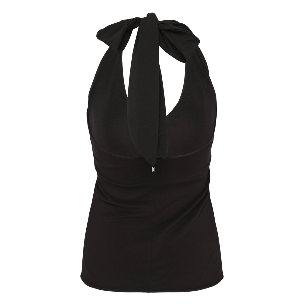 AMI black backless halter top with deep V-neckline and self-tie knot fastening at the neck, front view