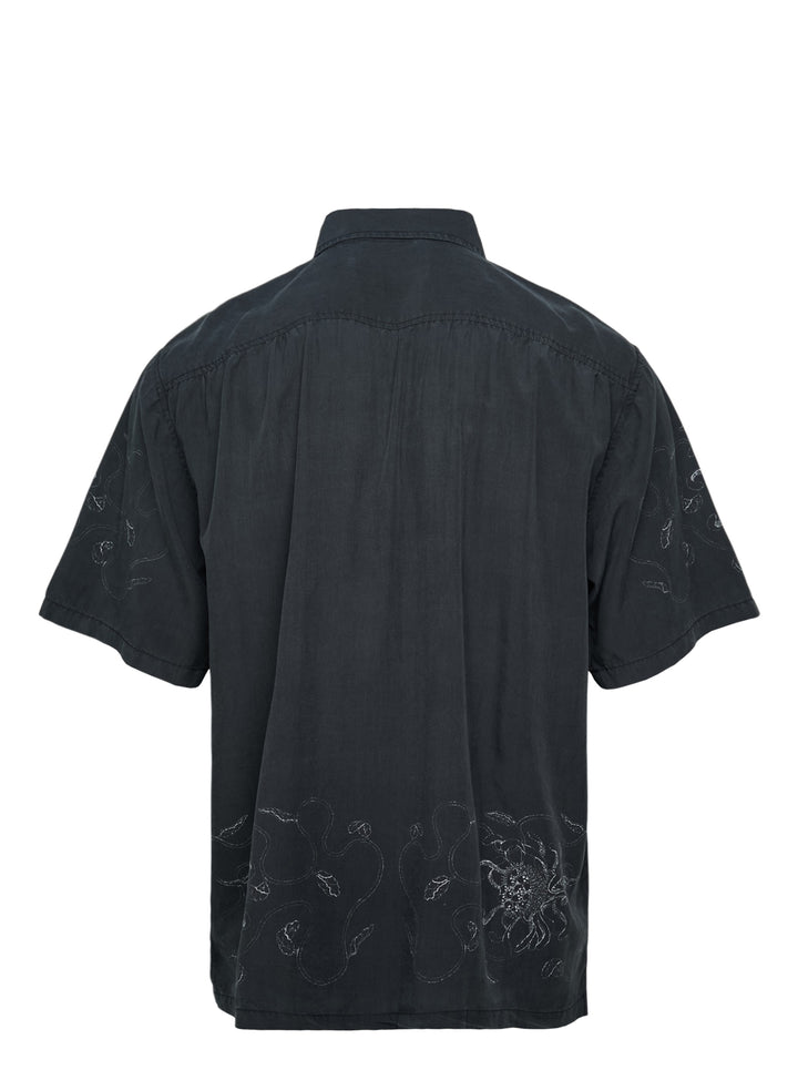 Our Legacy Every Short Sleeve Shirt in washed black with tonal floral embroidery on both sleeves and lower hem, featuring a boxy fit and pearlescent button fastening - view 2