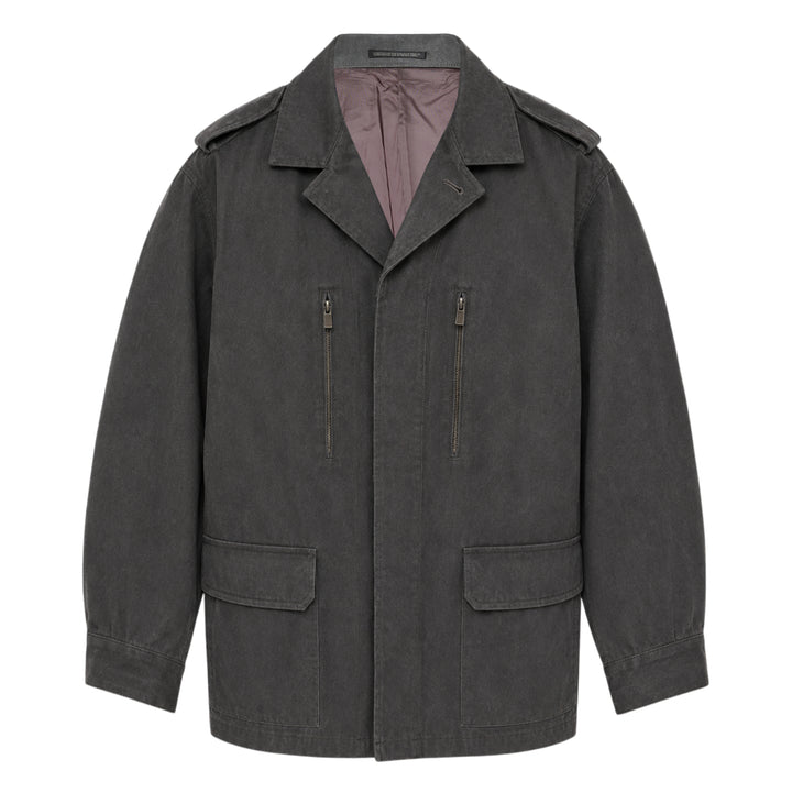 Yohji Yamamoto Military Field Coat in washed charcoal cotton canvas, displayed flat, showing open lapels with mauve lining, zip chest pockets, epaulette shoulders, and large flap cargo pockets