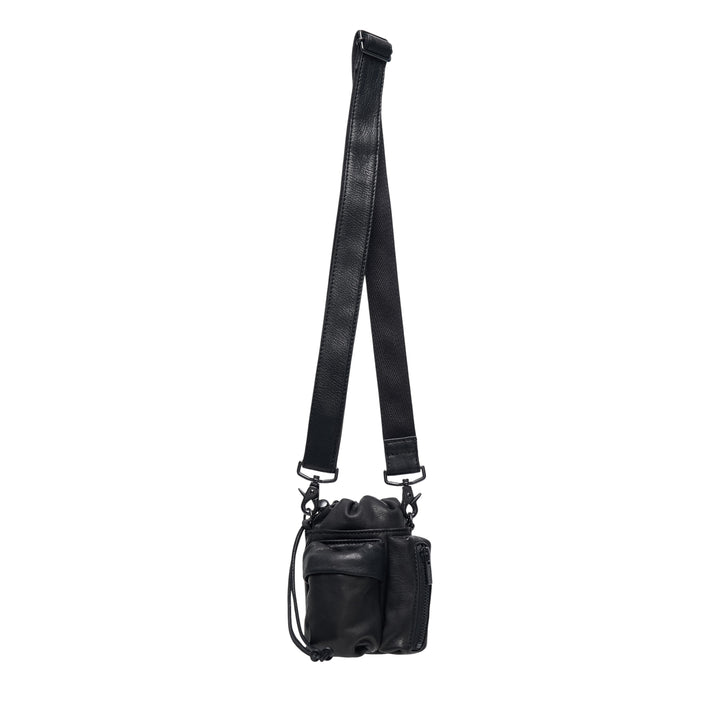 Y's 2 Way Mini Purse in black leather with long adjustable webbing crossbody strap, drawstring top closure, and exterior zip pocket, shown on white background