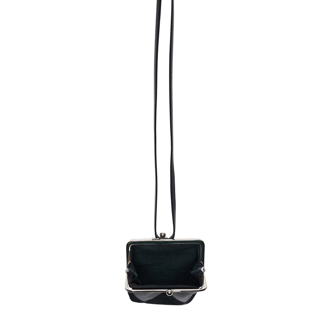 Y's black tonal argyle leather and suede patchwork mini pouch with silver-tone kiss-lock clasp, suspended from a long slender leather necklace cord against a white background