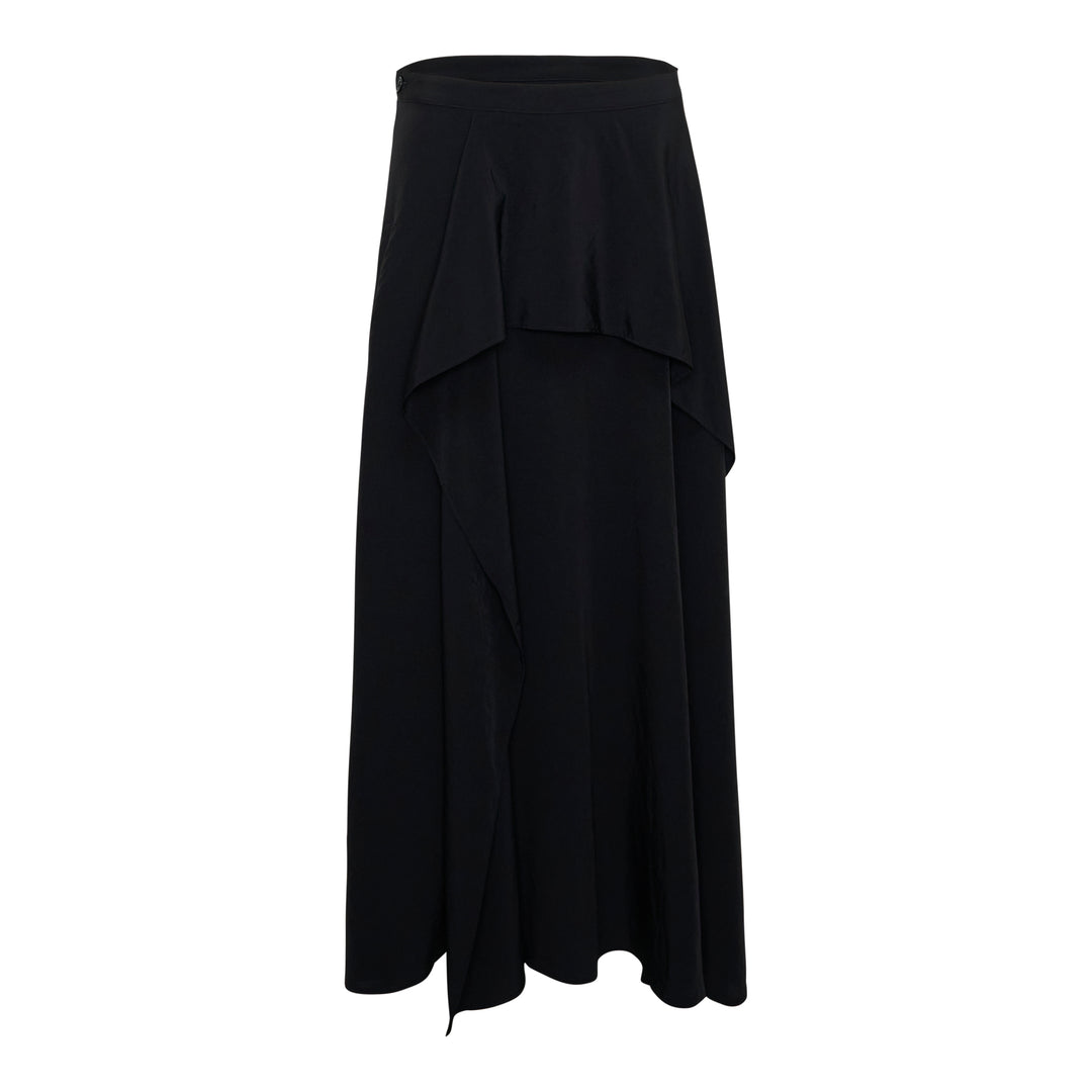 Y's black asymmetric drape midi skirt with layered ruffle overlay, panelled construction, and a sweeping flared hem, photographed flat on a white background