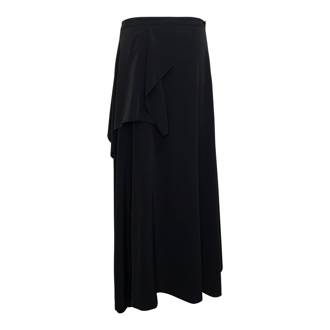 Y's black asymmetric drape midi skirt with layered ruffle overlay, panelled construction, and a sweeping flared hem, photographed flat on a white background