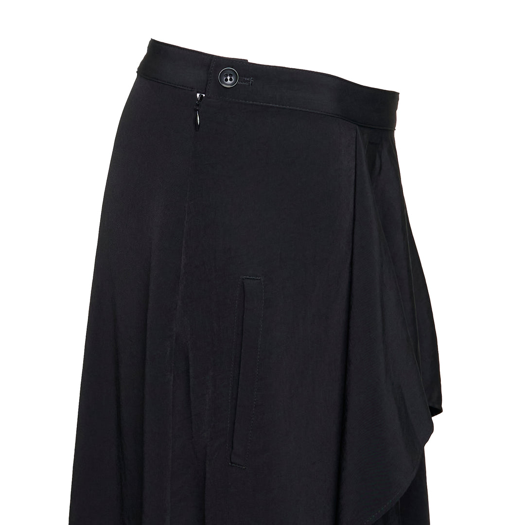 Y's black asymmetric drape midi skirt with layered ruffle overlay, panelled construction, and a sweeping flared hem, photographed flat on a white background